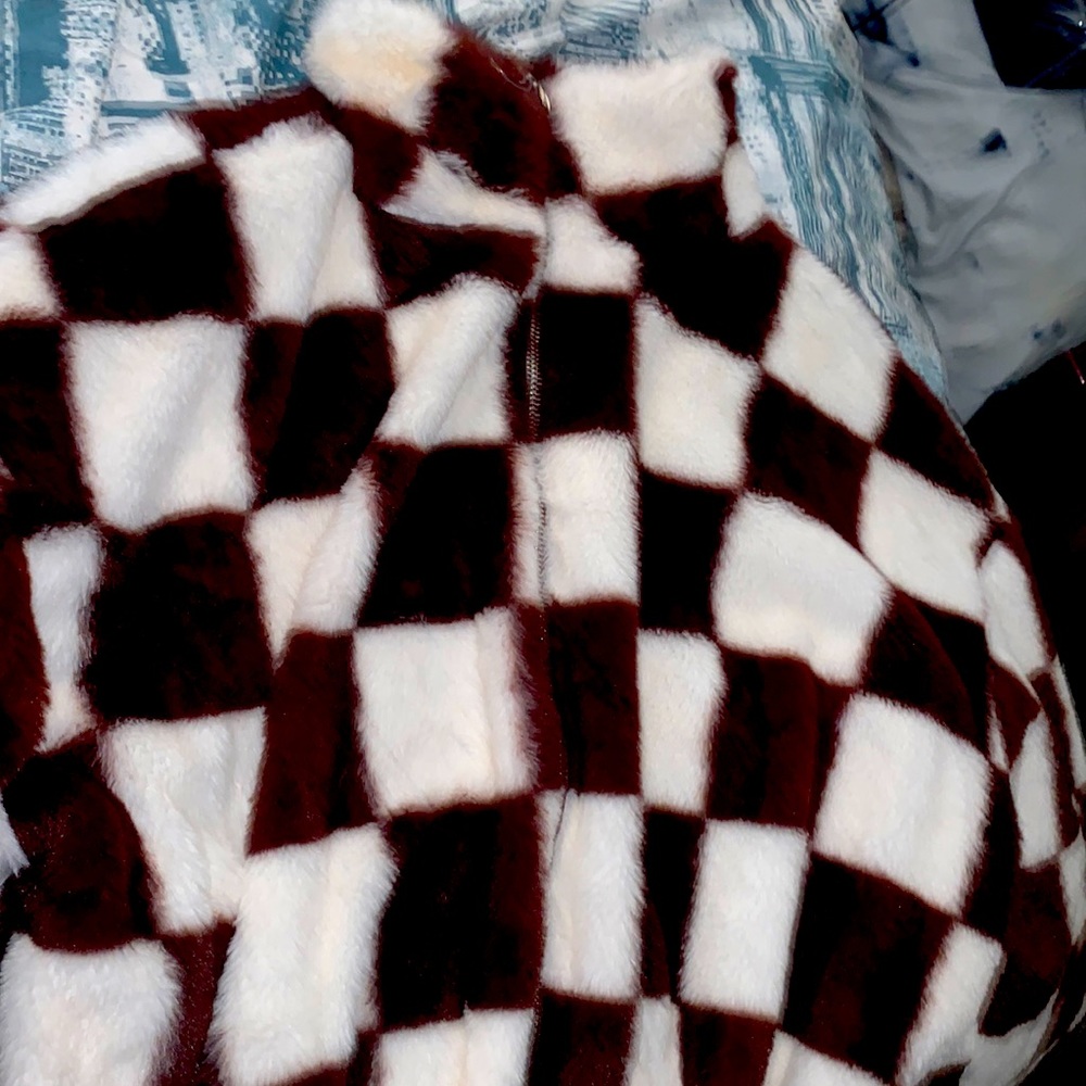 This is a fur checker sweater very good condition very pretty